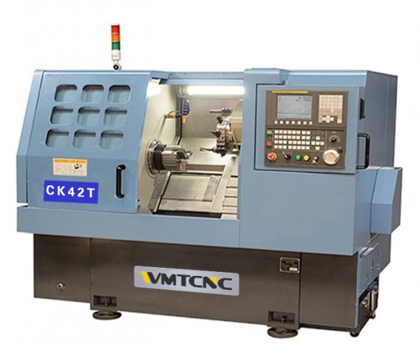 Токарный обрабатывающий центр с револьверной головкой WMT CNC Industrial Co., Ltd CK42T